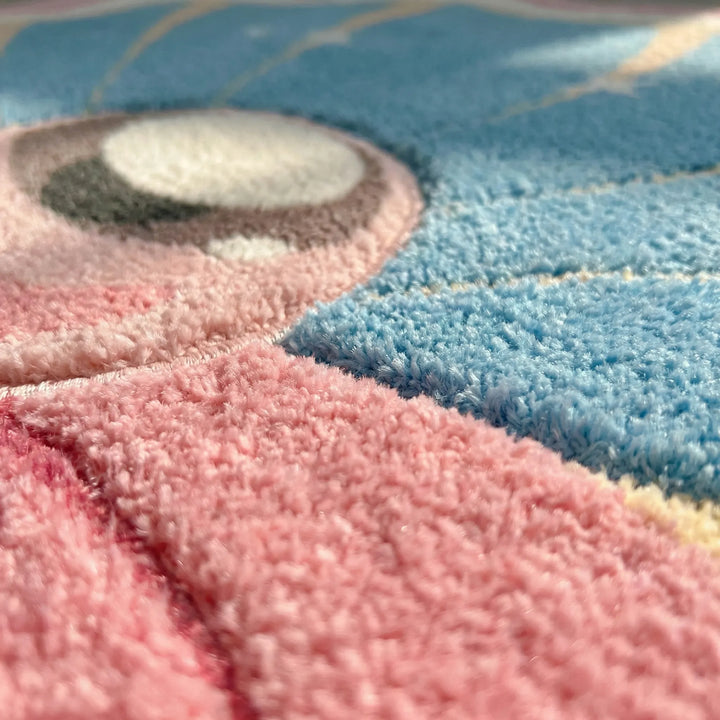 Decorative coastal shell accent rug with wave design, great as a durable floor mat for any home space.