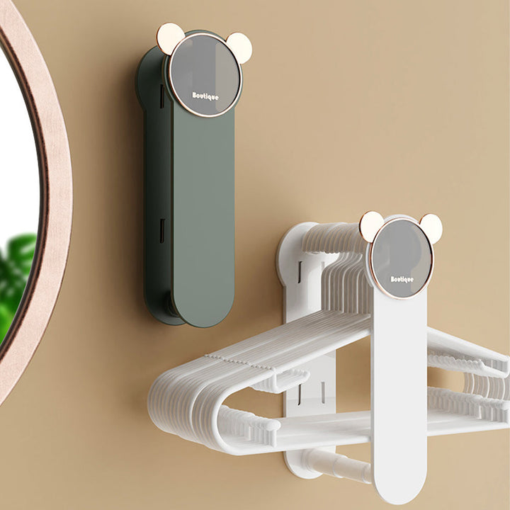 Space-saving wall hanger storage, helps maintain an organized closet and prevents hanger clutter.