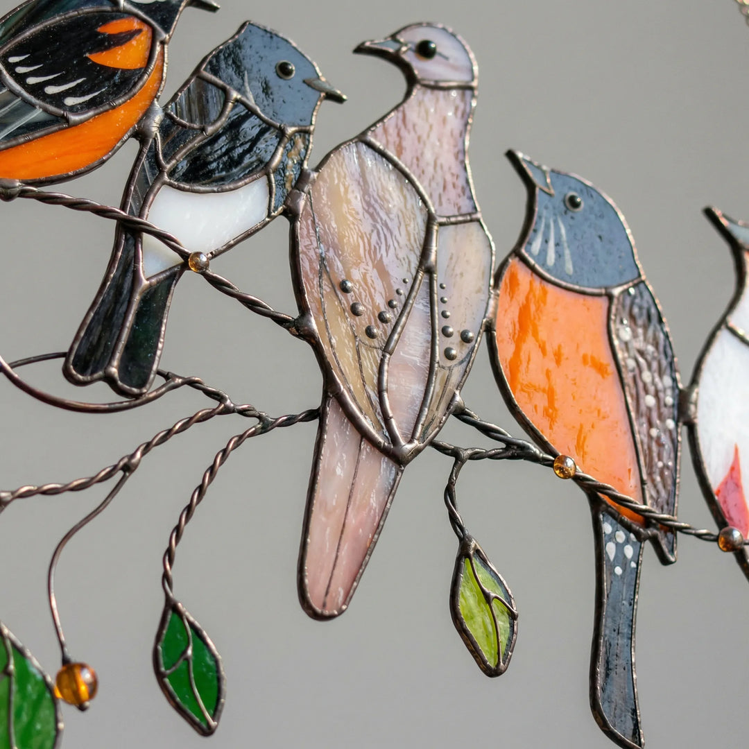 Exquisite stained glass bird suncatcher creating colorful light. Ideal window decor and unique home accent gift.