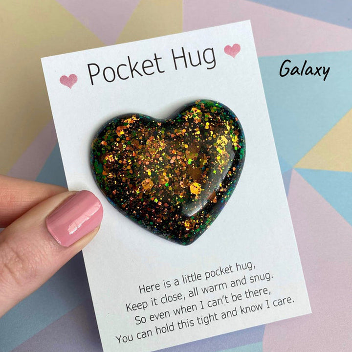 Detailed view of a handmade resin Pocket Hug heart, a unique anxiety relief gift