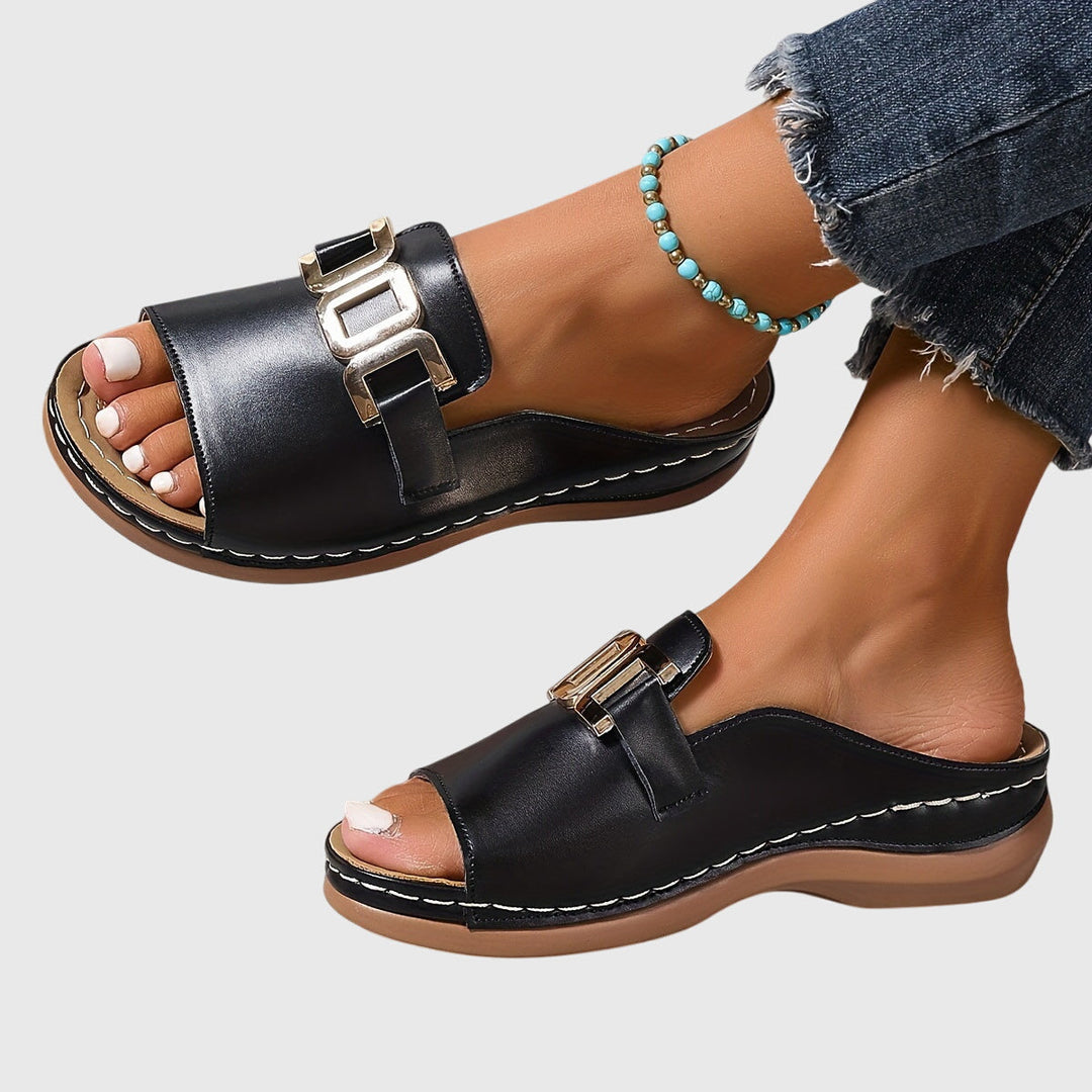 Stylish women's flat buckle sandals with elegant gold details. Open toe, comfy, cushioned for summer everyday wear.