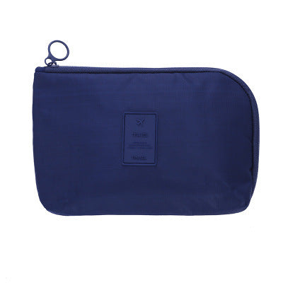 Waterproof gadget holder & accessory bag. Compact electronics organizer for seamless travel.