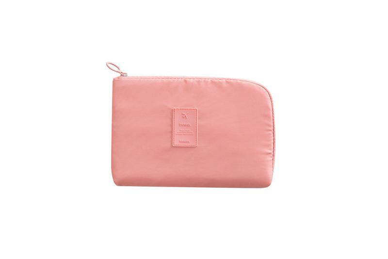 Side profile: sleek waterproof electronics organizer, perfect for cables and chargers on the go.