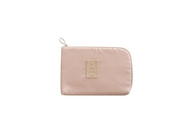 Keep your tech tidy with this unisex compact waterproof electronics & cable management travel pouch.