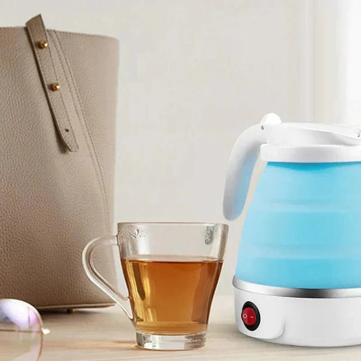 Portable travel kettle, ideal for hot water, tea, coffee in dorms, office, or camping. Collapsible electric design.