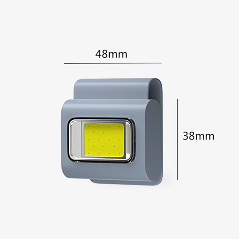 Work light illuminating a dark workspace, demonstrating its effectiveness as a reliable flashlight