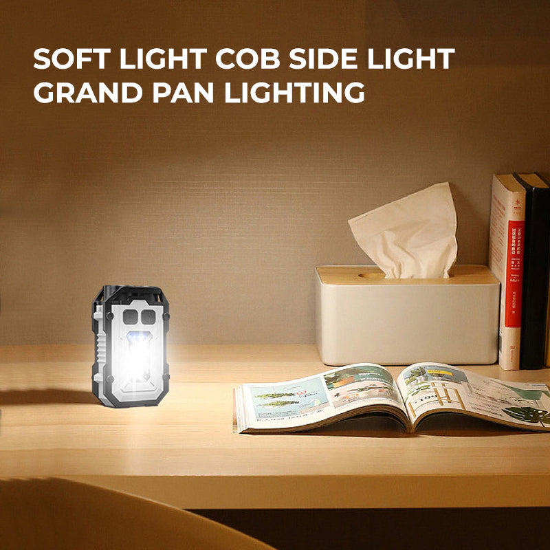Mini LED flashlight, rechargeable, black, with keychain attachment, ideal for everyday carry & camping