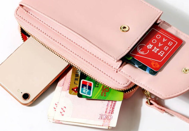 Faux leather women's crossbody bag, compact size, elegant design, adjustable strap.