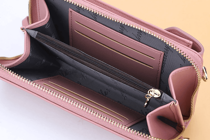 Sleek women's compact PU leather crossbody bag, a versatile fashion accessory with an adjustable strap.