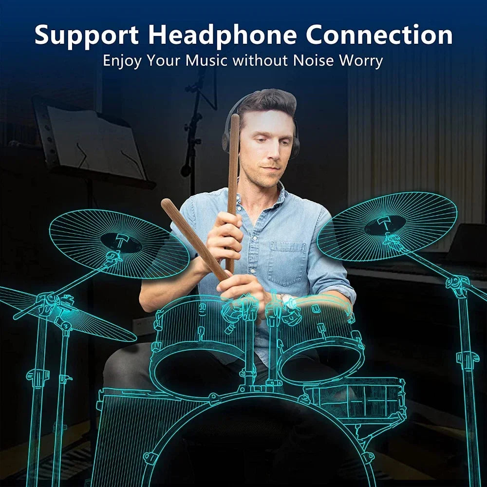 Person playing the RhythmoMax portable electronic drum set, enjoying silent practice at home.