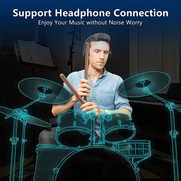 Person playing the RhythmoMax portable electronic drum set, enjoying silent practice at home.