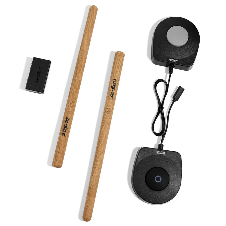 Close-up of RhythmoMax portable electronic drum pads and sound module, ready for silent practice.