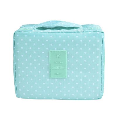 Compact waterproof makeup travel organizer, dark blue with floral print, for women's cosmetics.