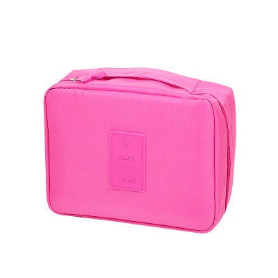 Portable compact beauty bag, waterproof for toiletries, women's travel essential.