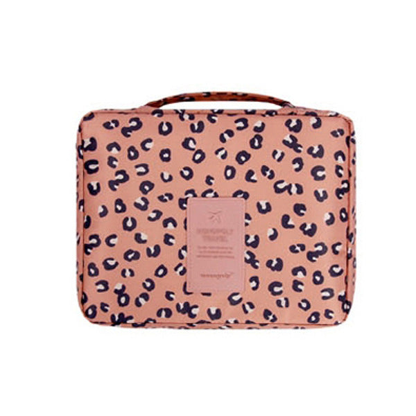 Dark blue floral compact makeup case, waterproof, keeps cosmetics safe & organized.