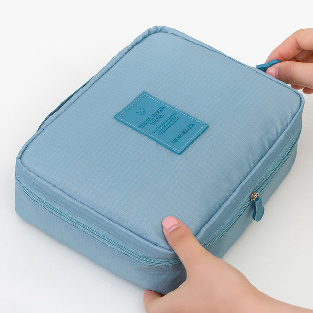 Compact floral print waterproof makeup bag, women's travel organizer with multiple compartments.