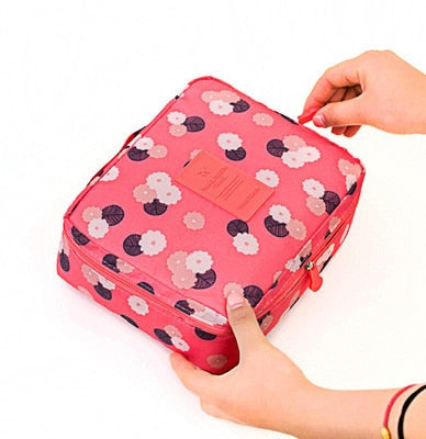 Women's portable beauty storage, dark blue waterproof cosmetic case for travel.