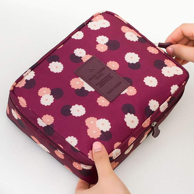 Waterproof cosmetic travel bag, floral pattern, compact and easy to carry for women.