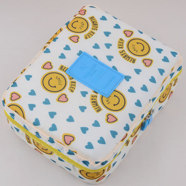 Secure zip waterproof travel cosmetic case, dark blue, perfect for women's makeup.