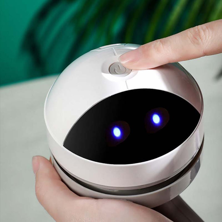 Compact white mini vacuum, perfect for students and professionals in any office setting.