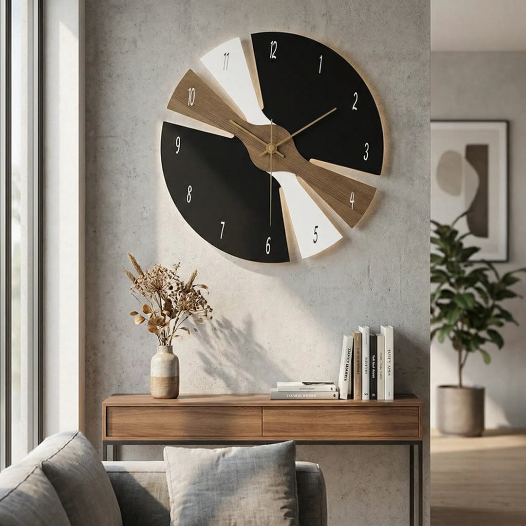 Contemporary silent wall clock, ideal for modern living room decor. Minimalist design in black/gray finish.