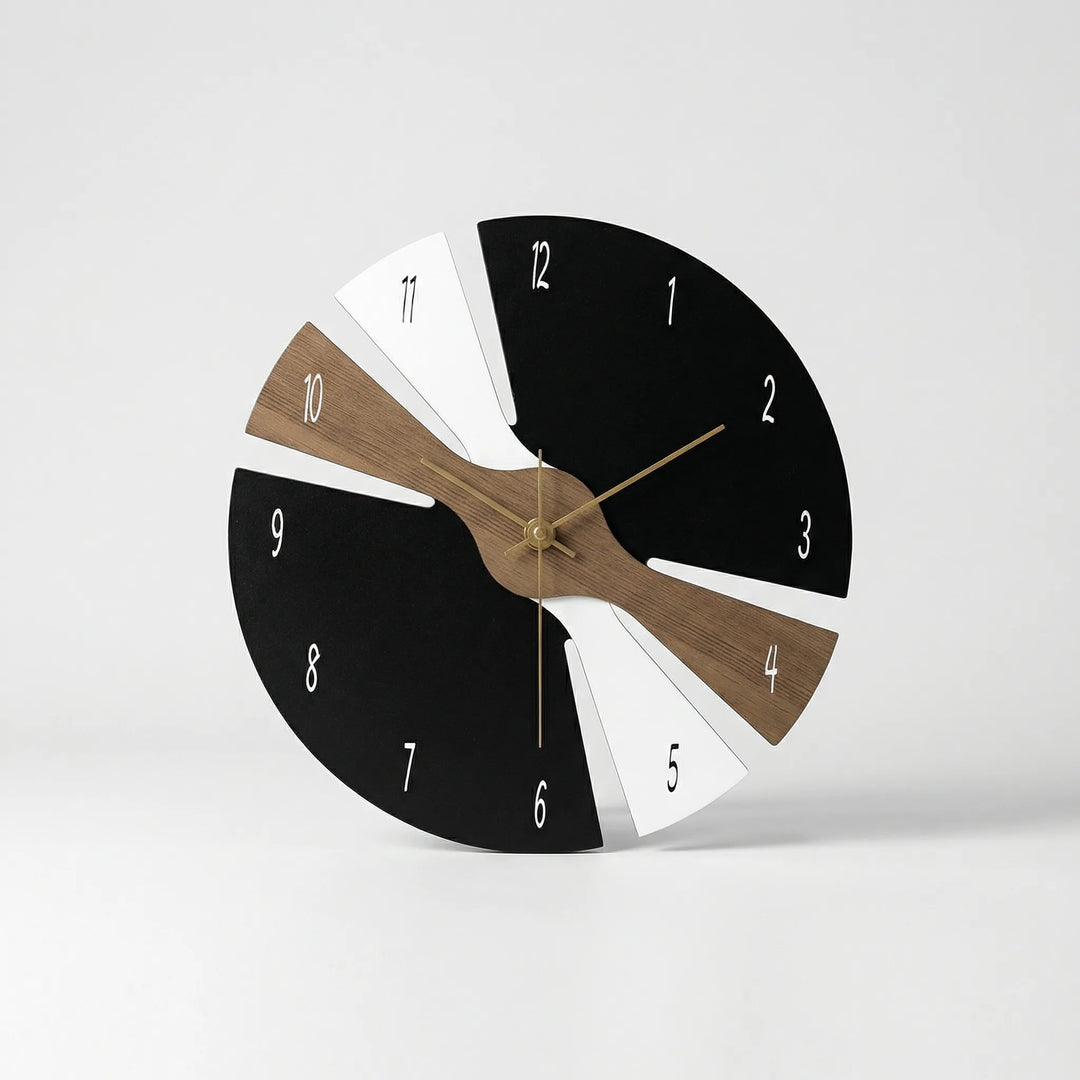 Modern minimalist wall clock with silent sweep movement. Perfect contemporary home or office decor accent.