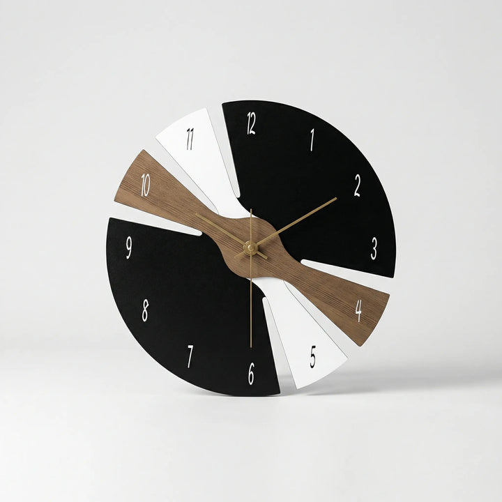 Modern minimalist wall clock with silent sweep movement. Perfect contemporary home or office decor accent.