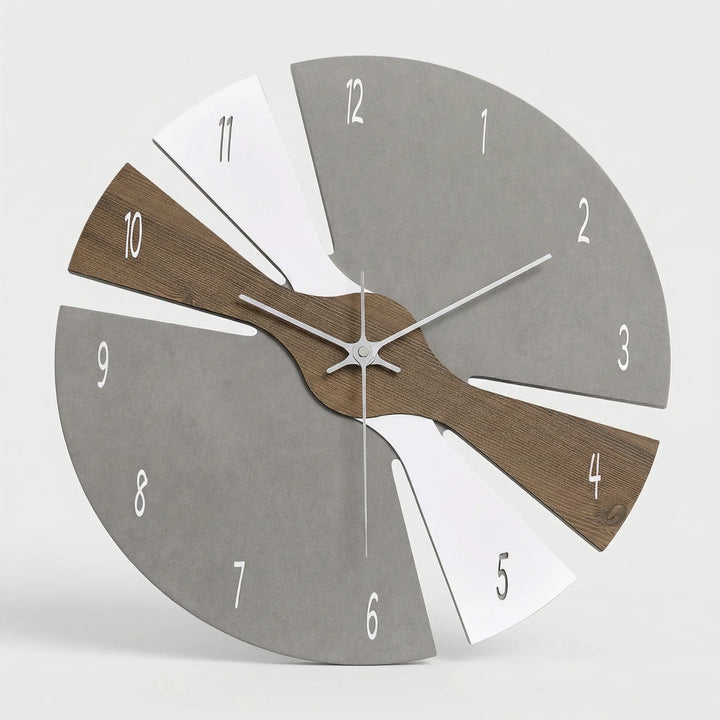 Elegant minimalist wall clock, black/gray, for modern home or office decor. Contemporary design, silent operation.