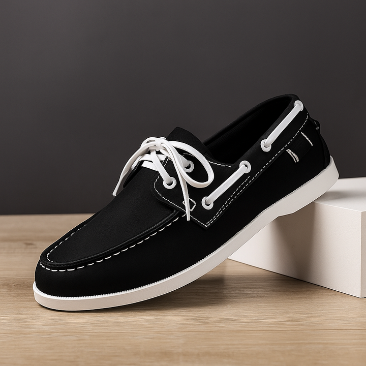 Corvan men's deck loafers from a top-down view, highlighting the easy slip-on design and casual style.