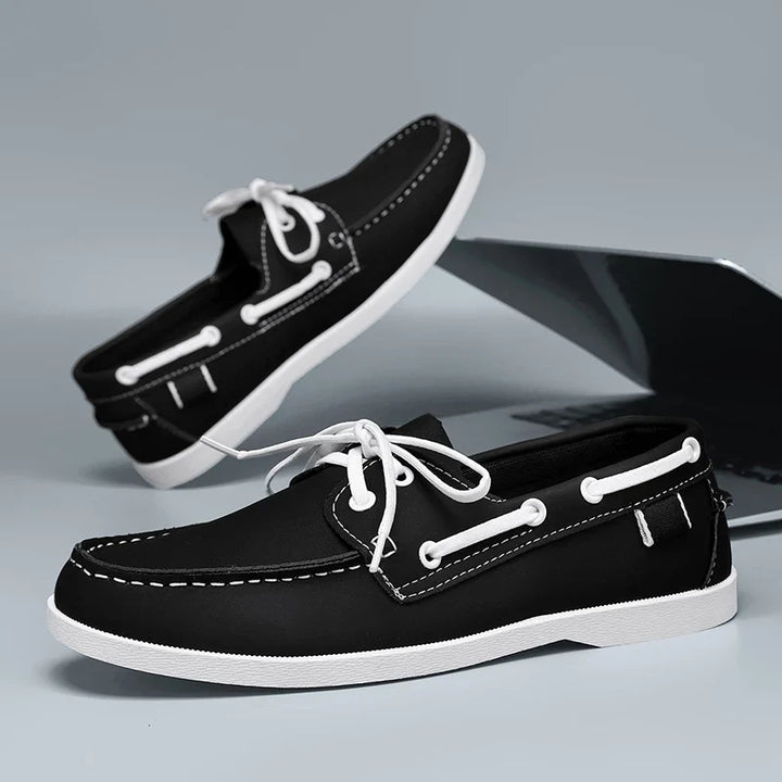 Detail of the sole of Corvan men's deck loafers, showing grip for comfortable casual footwear.