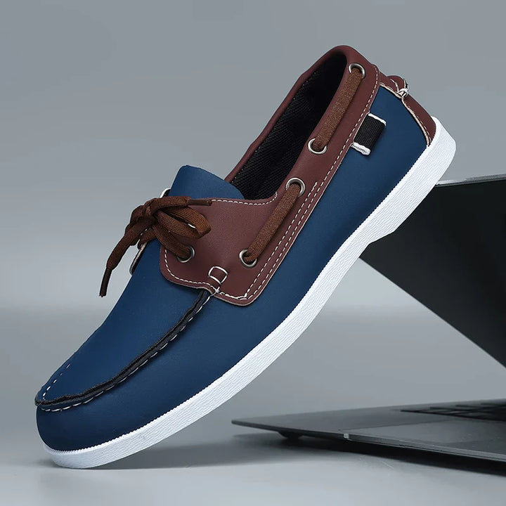 Corvan men's deck loafers in a light color, perfect for summer outfits and versatile casual wear.
