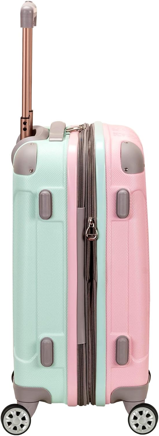 Expandable Cotton Candy hardside carry-on luggage, lightweight with double spinner wheels for extra packing space.