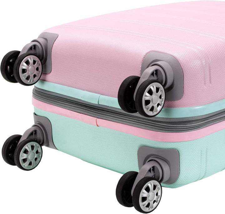 Vibrant Cotton Candy expandable hardside carry-on luggage, ready for travel with smooth double spinner wheels.