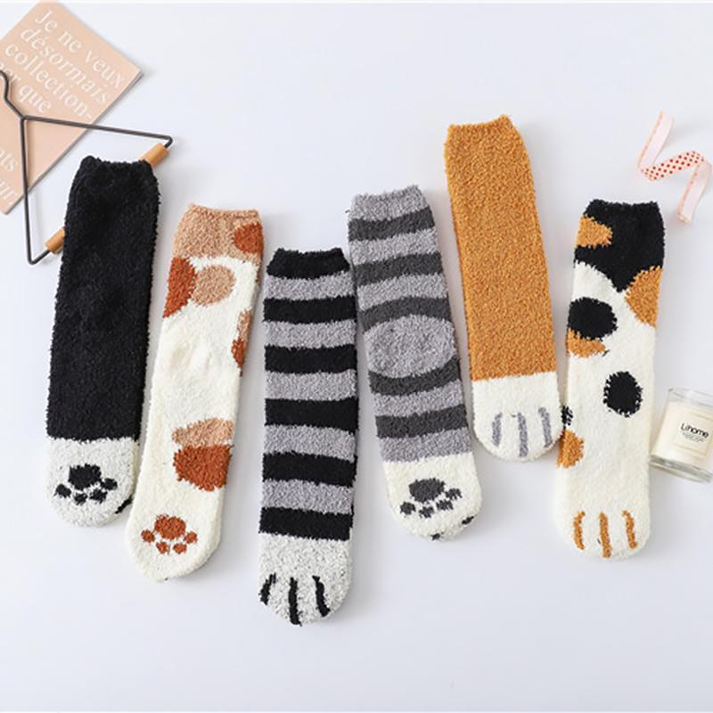Women's novelty ankle socks featuring a unique and cute cat paw print, soft and cozy cotton material