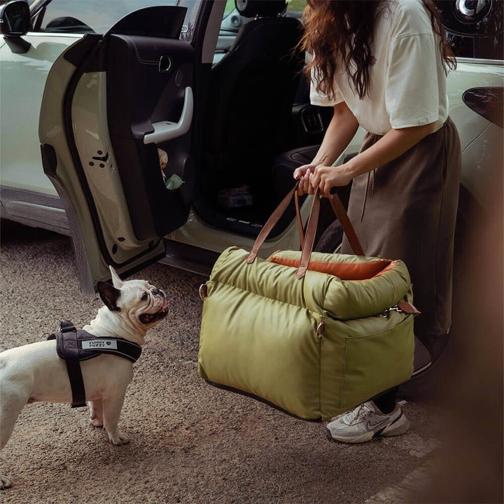 Waterproof faux leather dog car seat. Pet booster for secure, comfortable, and clean car travel.