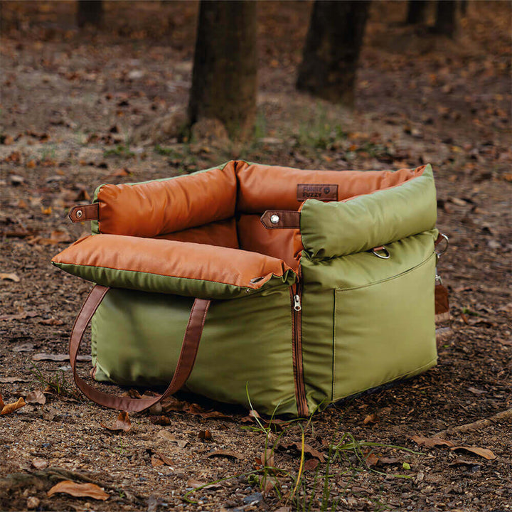 Cozy faux leather dog bed for car travel. Secure and comfortable pet booster seat.