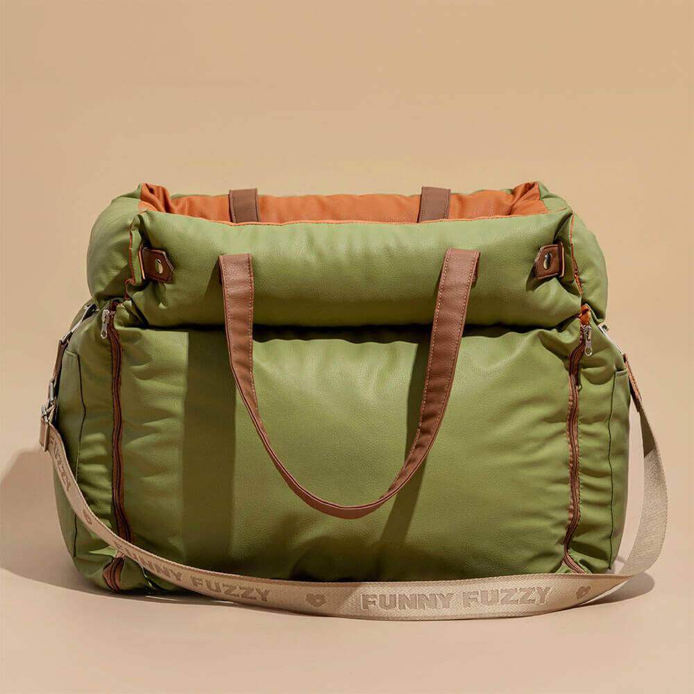 Faux leather pet booster seat for cars. Combines safety, comfort, and style for dog travel.