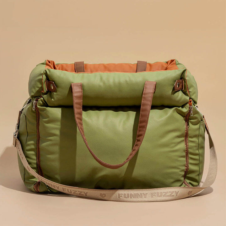 Faux leather pet booster seat for cars. Combines safety, comfort, and style for dog travel.
