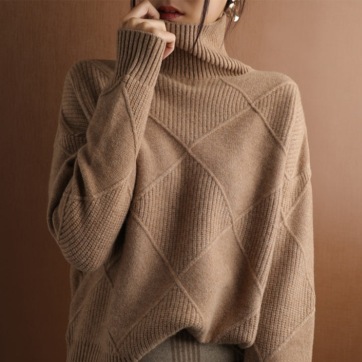 Close-up of the neckline of a women's cozy oversized ribbed knit fall sweater