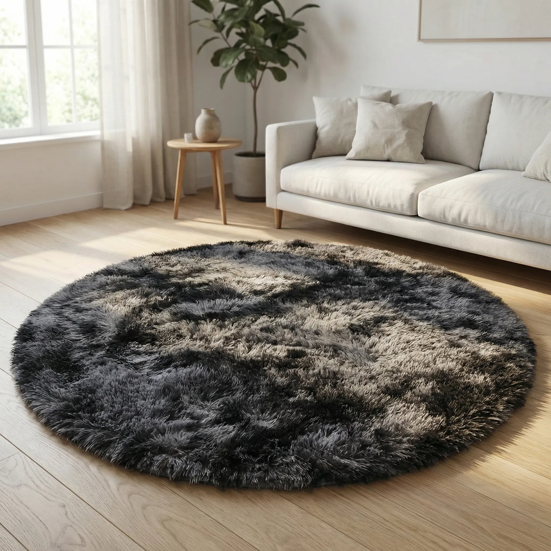 Cozy round tie-dye plush area rug with modern wave design, a soft accent for home decor.