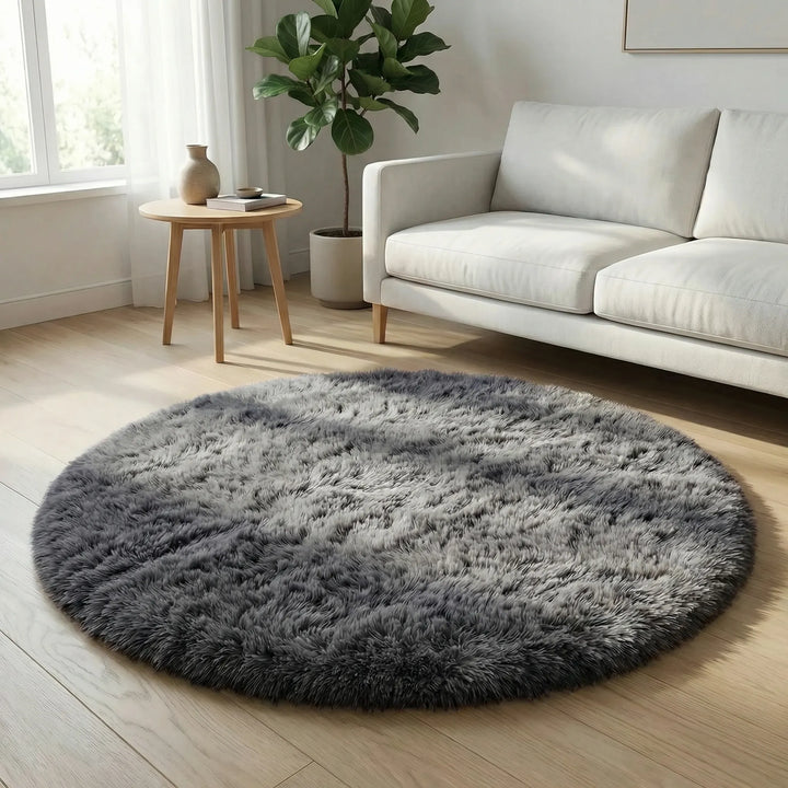 Modern round tie-dye area rug with flowy waves, enhancing living room spaces with plush texture.