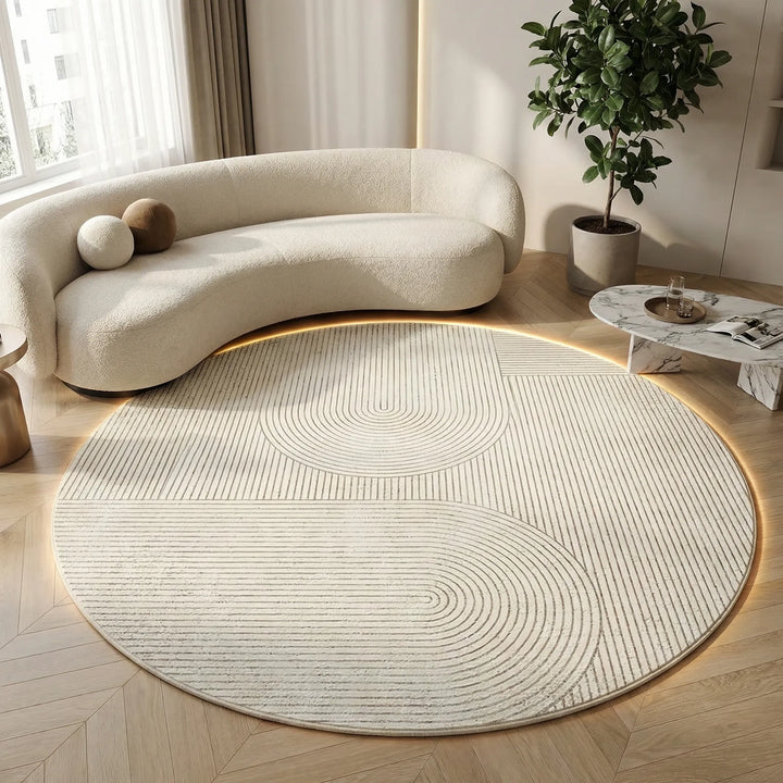 Cozy round velvet area rug with a modern wave design, soft texture, and non-slip backing, perfect for living room decor.