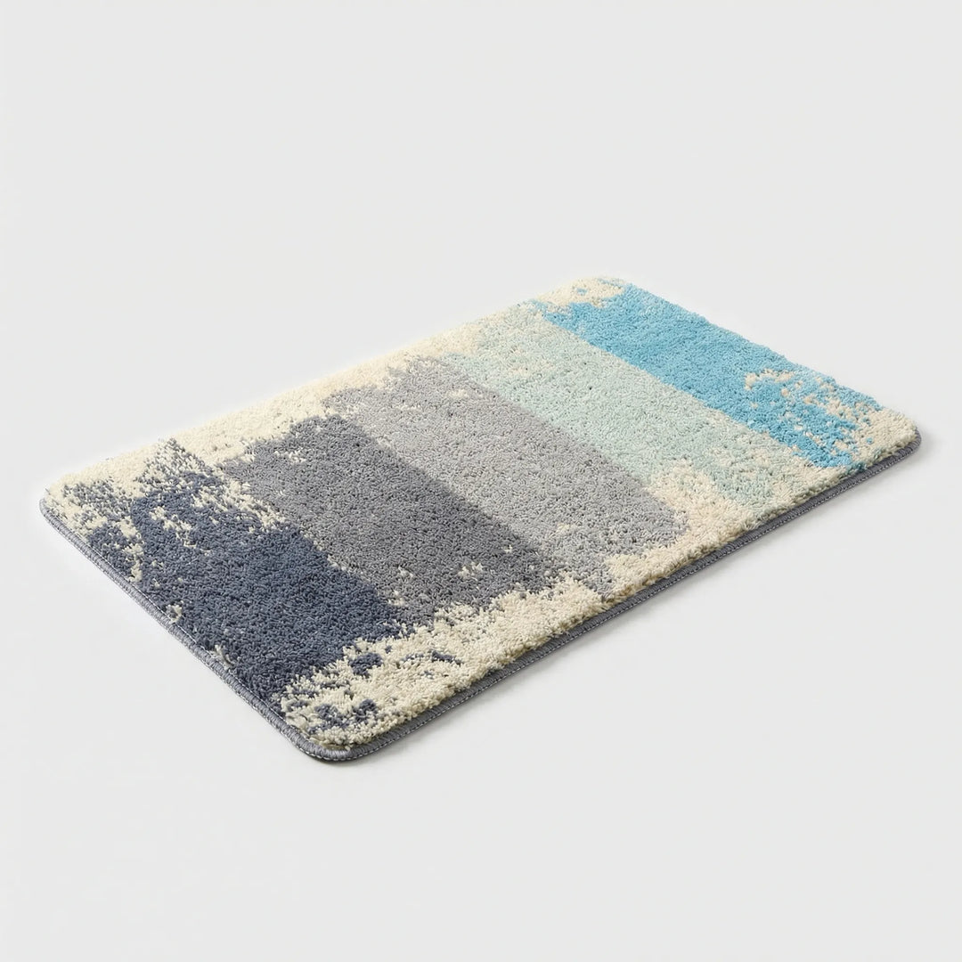 Flowique statement area rug featuring waves, a soft retro bath mat with non-slip for cozy bathroom style.