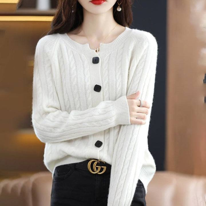 Versatile women's cardigan, button-up and relaxed fit, providing warmth and comfort as casual outerwear.