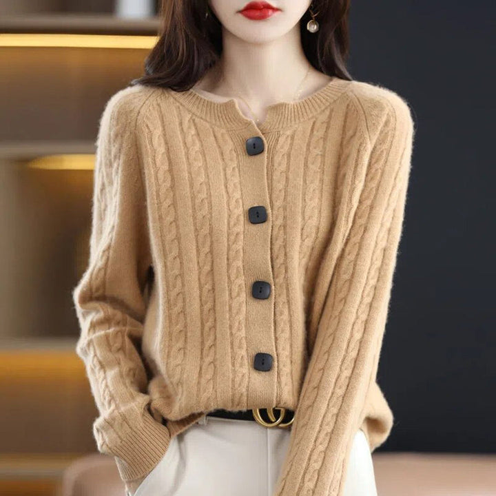 Cream-colored cozy button-up cardigan for women, featuring a relaxed fit and detailed knitwear texture.