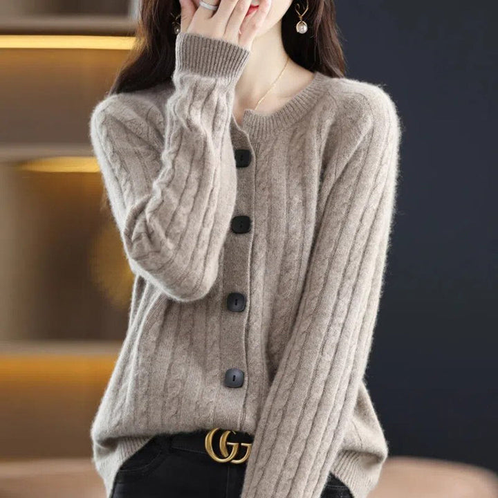 Close-up of a women's cozy button-up cardigan showing its soft knitwear and relaxed fit.