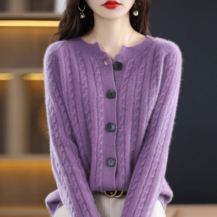 Women's casual cable-knit cardigan with buttons, designed for warmth and a relaxed, comfortable fit.