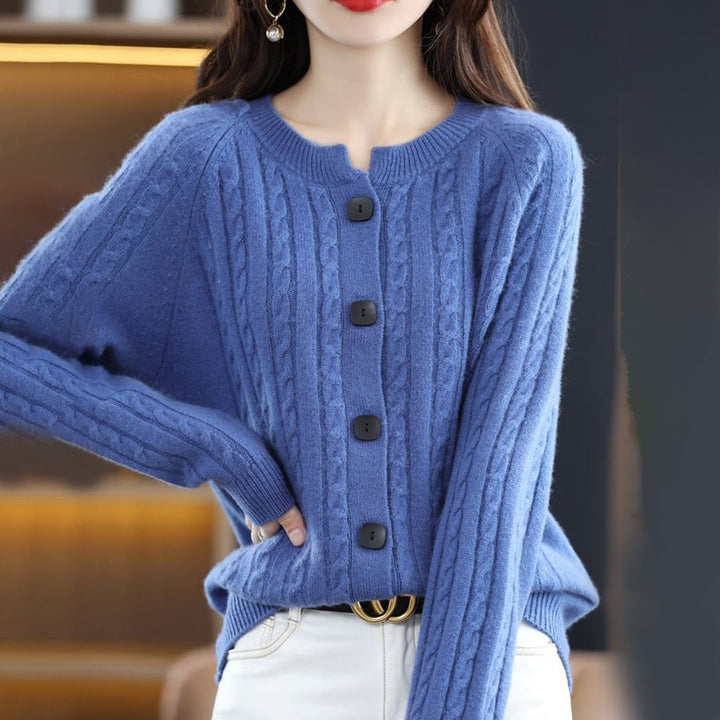 Full shot of a model wearing a women's cozy button-up relaxed fit cardigan, perfect for layering.