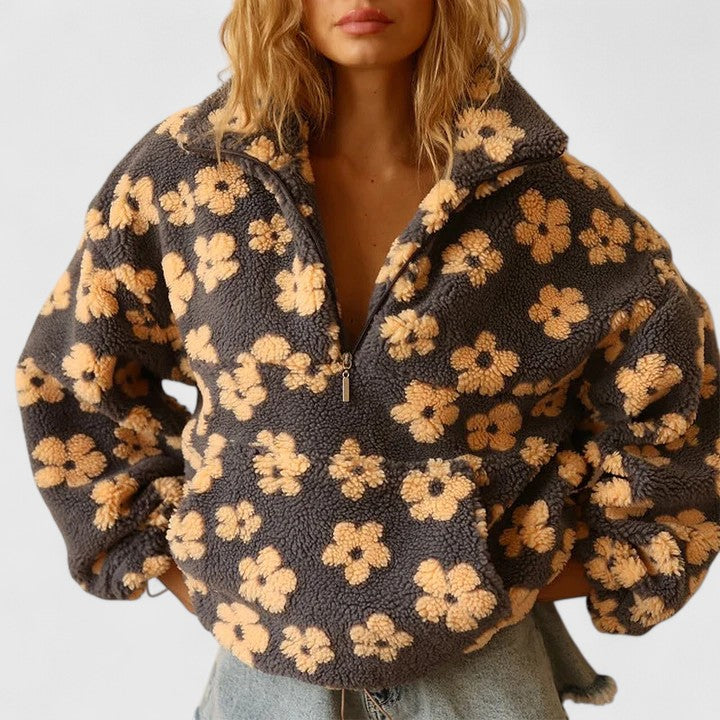 Cozy women's floral quarter-zip pullover sweater. Stylish, oversized fit for autumn & winter comfort. Everyday fashion.