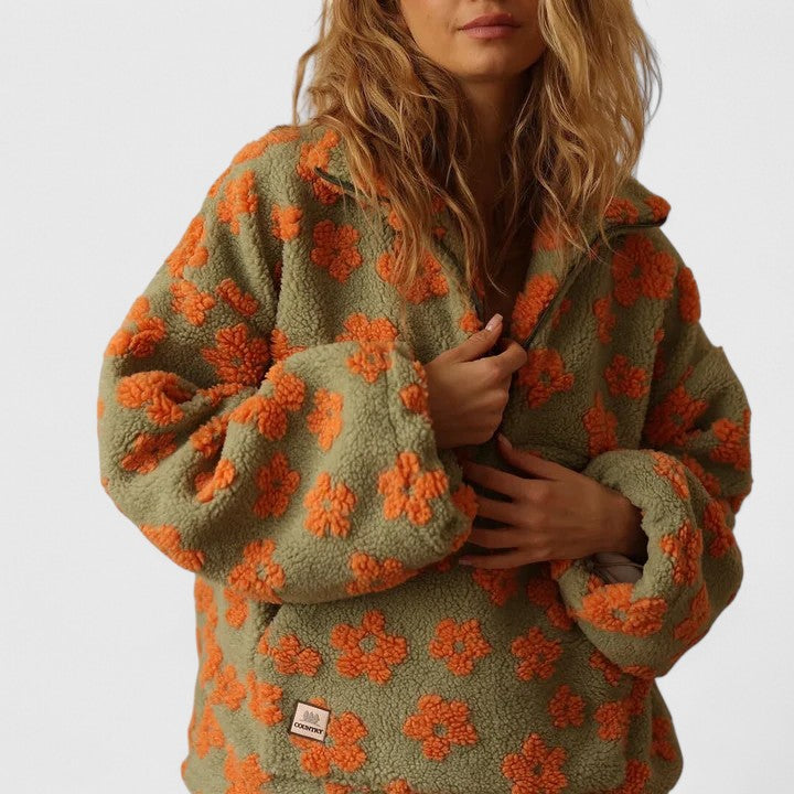 Versatile women's floral quarter-zip pullover sweater. Cozy, stylish, and perfect for casual everyday wear.